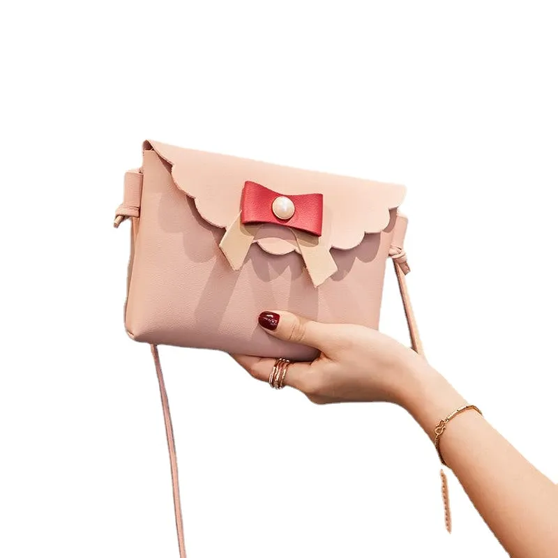 Bags 2024 Japanese and Korean new women's bags pearl bow casual small square bag hand-held shoulder crossbody mobile phone bag